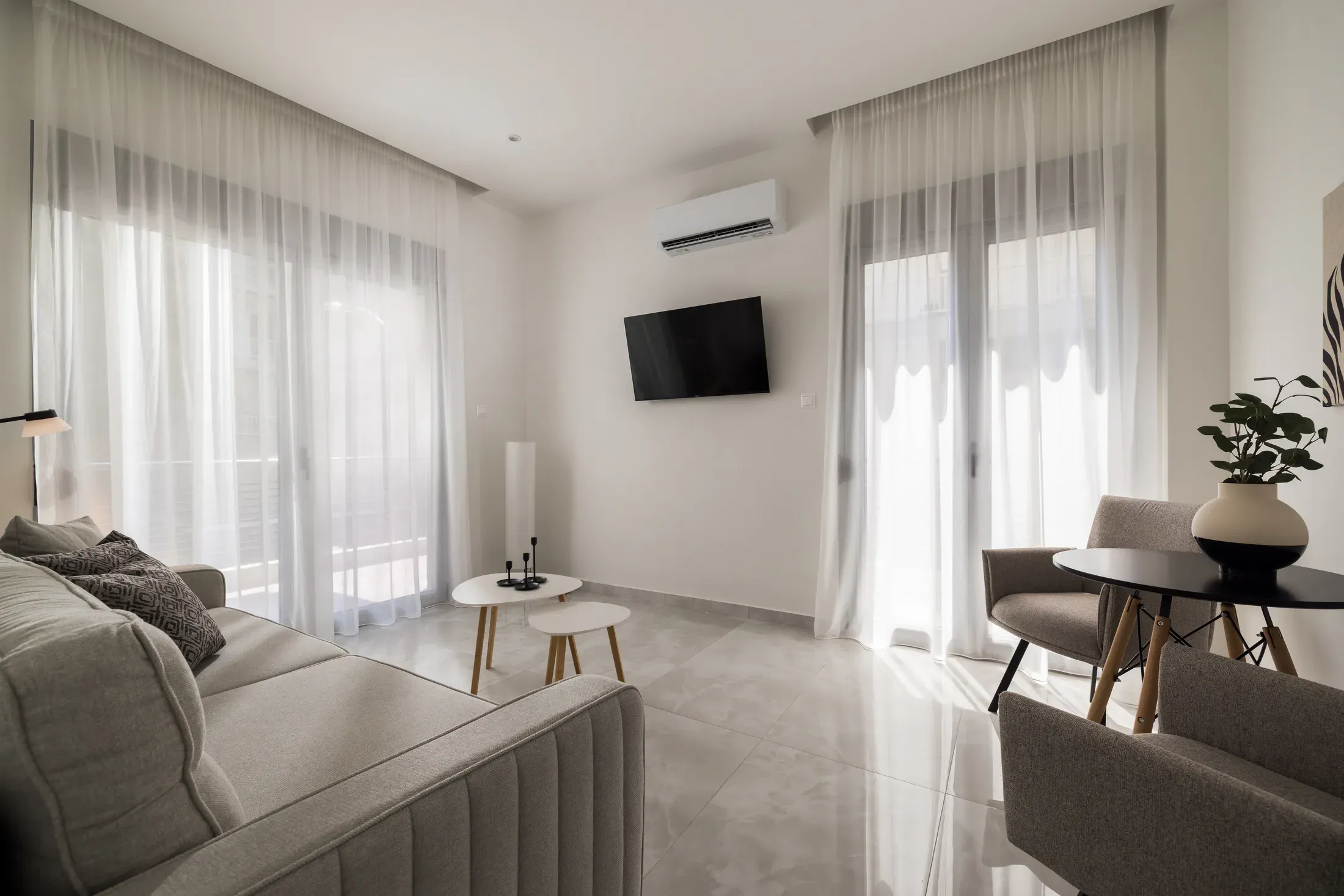 Sunlit living room in a CITIZEN apartment