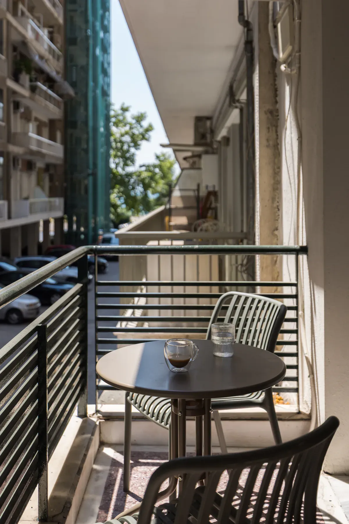 Private balcony with outdoor table and neighbourhood view